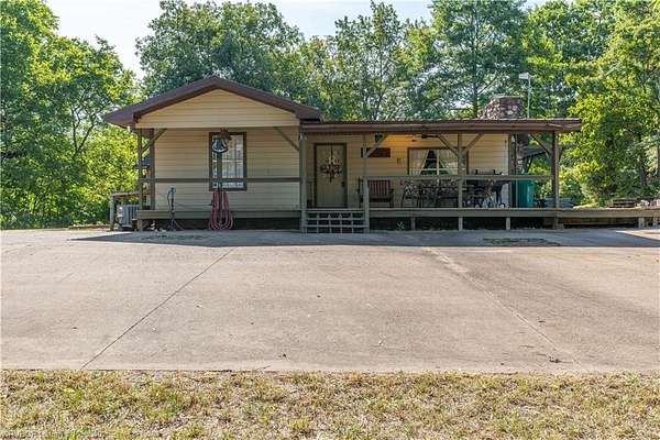 49.5 Acres of Land with Home for Sale in Mena, Arkansas