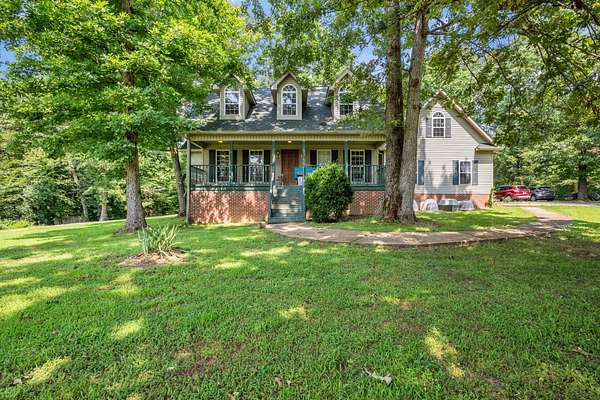32.3 Acres of Agricultural Land with Home for Sale in Hurricane Mills, Tennessee
