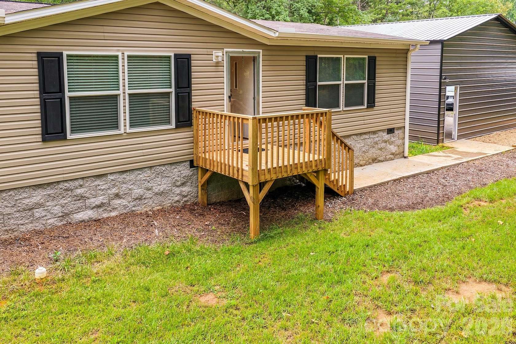 2 Acres of Land with Home for Sale in Mill Spring, North Carolina