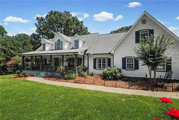 8.43 Acres of Land with Home for Sale in Ball Ground, Georgia