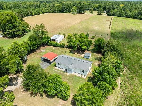 3.49 Acres of Land with Home for Sale in Rembert, South Carolina
