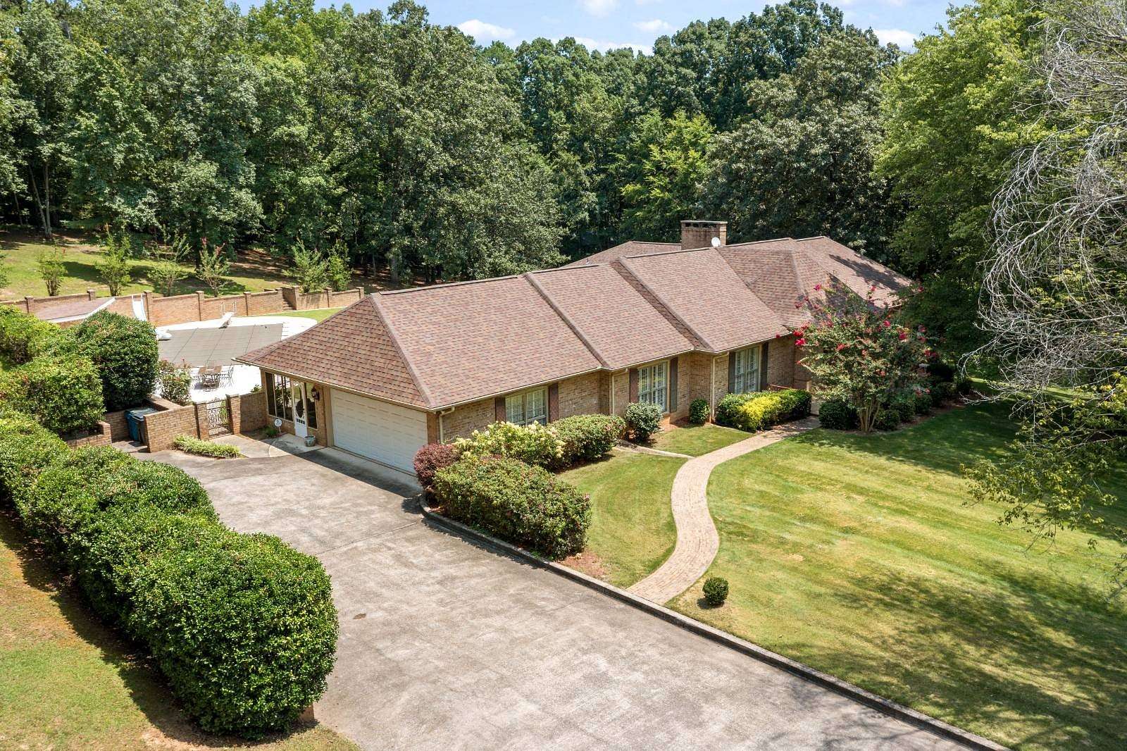 2.69 Acres of Land with Home for Auction in Jacksonville, Alabama