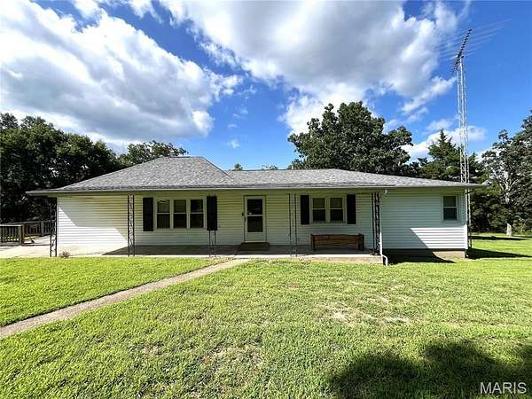 5.8 Acres of Land with Home for Sale in Cherryville, Missouri