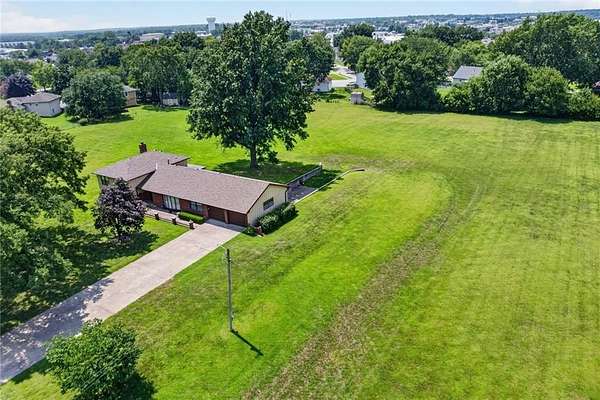 4 Acres of Land with Home for Sale in Belton, Missouri