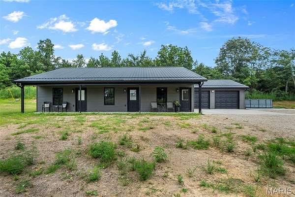 2.4 Acres of Improved Residential Land for Sale in Millersville, Missouri