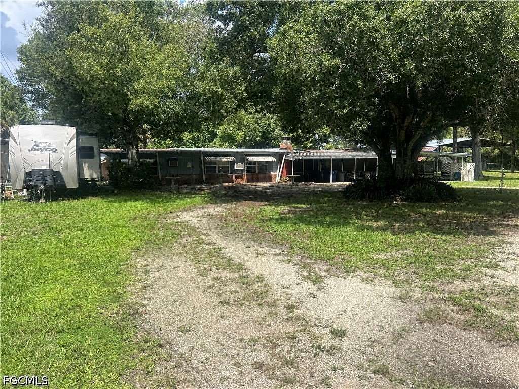 2.62 Acres of Land with Home for Sale in North Fort Myers, Florida