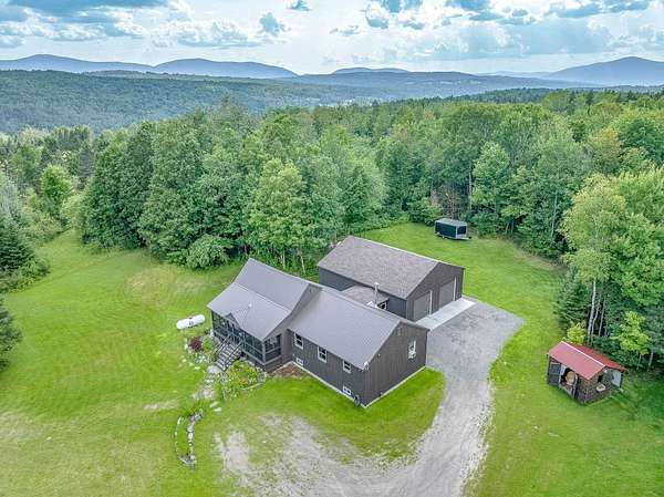5.12 Acres of Land with Home for Sale in Colebrook, New Hampshire