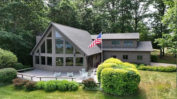 12.5 Acres of Land with Home for Sale in Onekama, Michigan