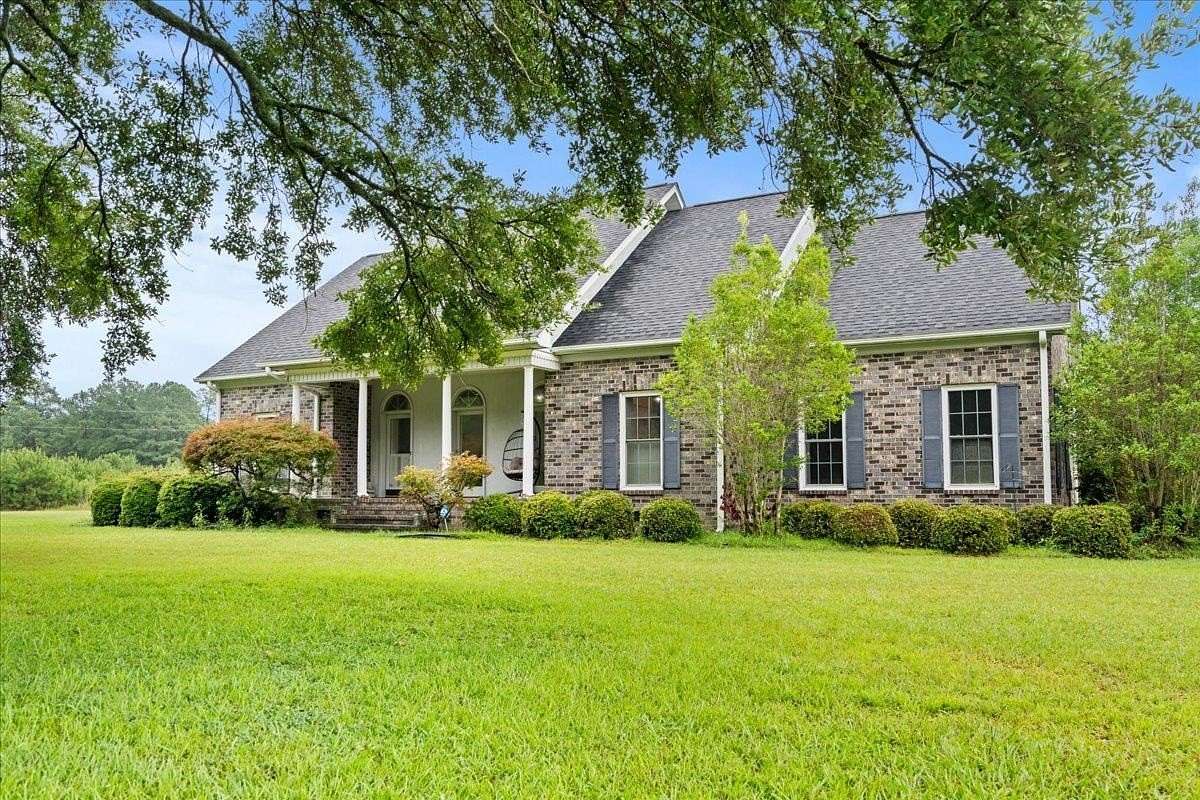 5.7 Acres of Land with Home for Sale in Florence, South Carolina