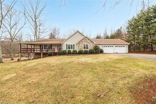 5.85 Acres of Land with Home for Sale in Sandy Ridge, North Carolina