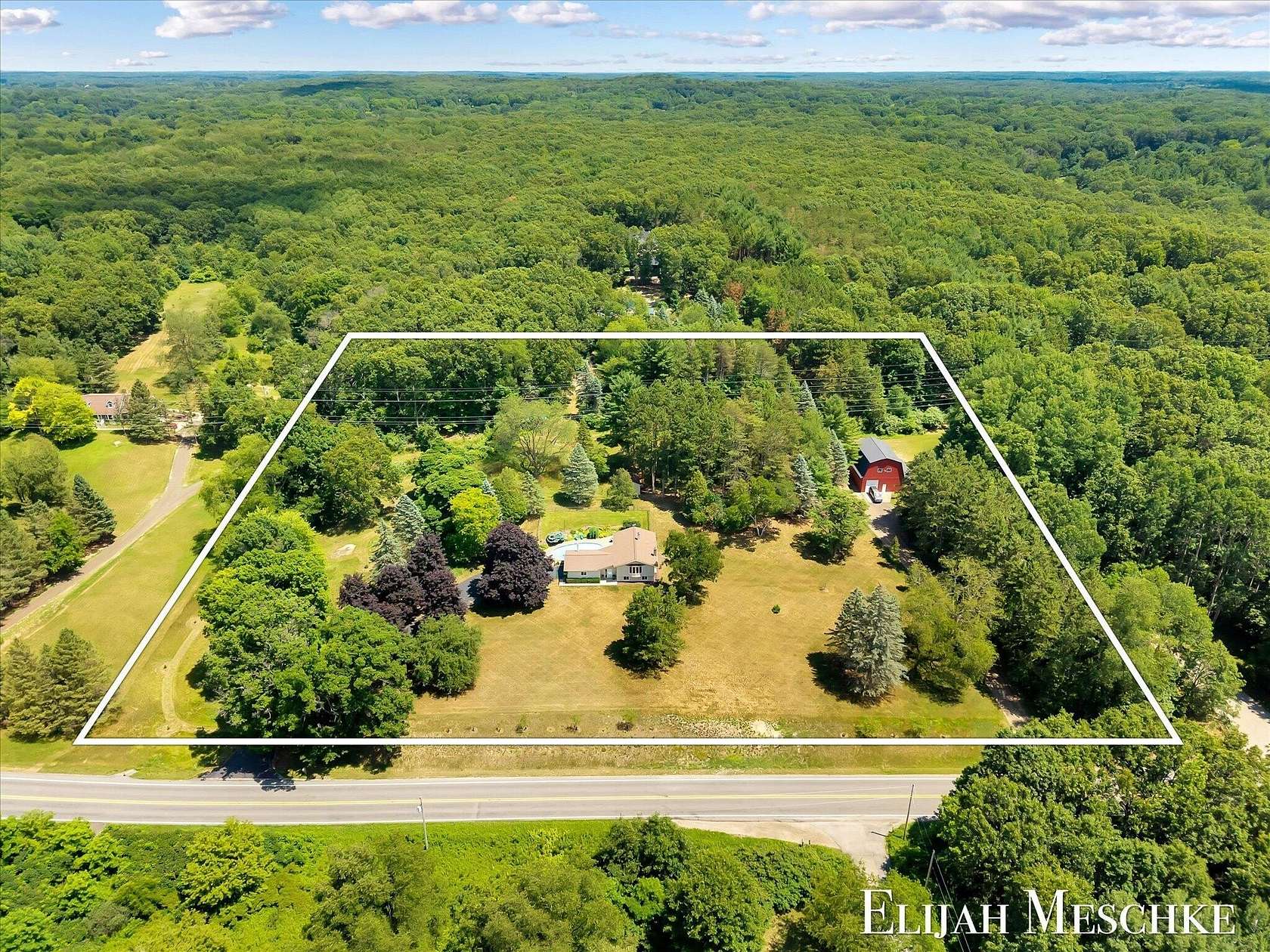 7 Acres of Land with Home for Sale in Rockford, Michigan