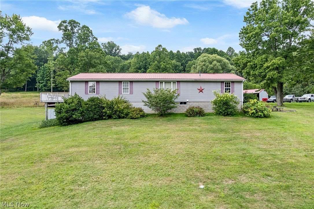 13 Acres of Land with Home for Auction in East Sparta, Ohio