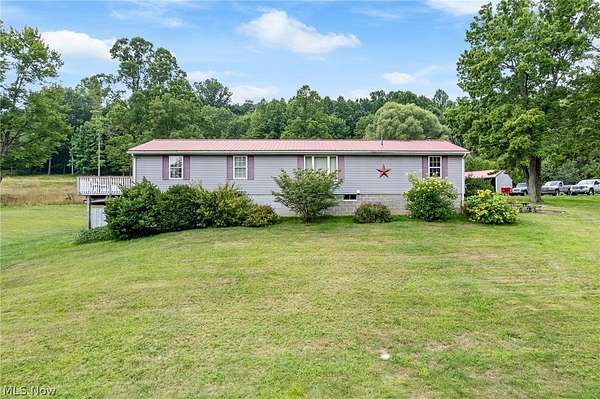 13 Acres of Land with Home for Auction in East Sparta, Ohio