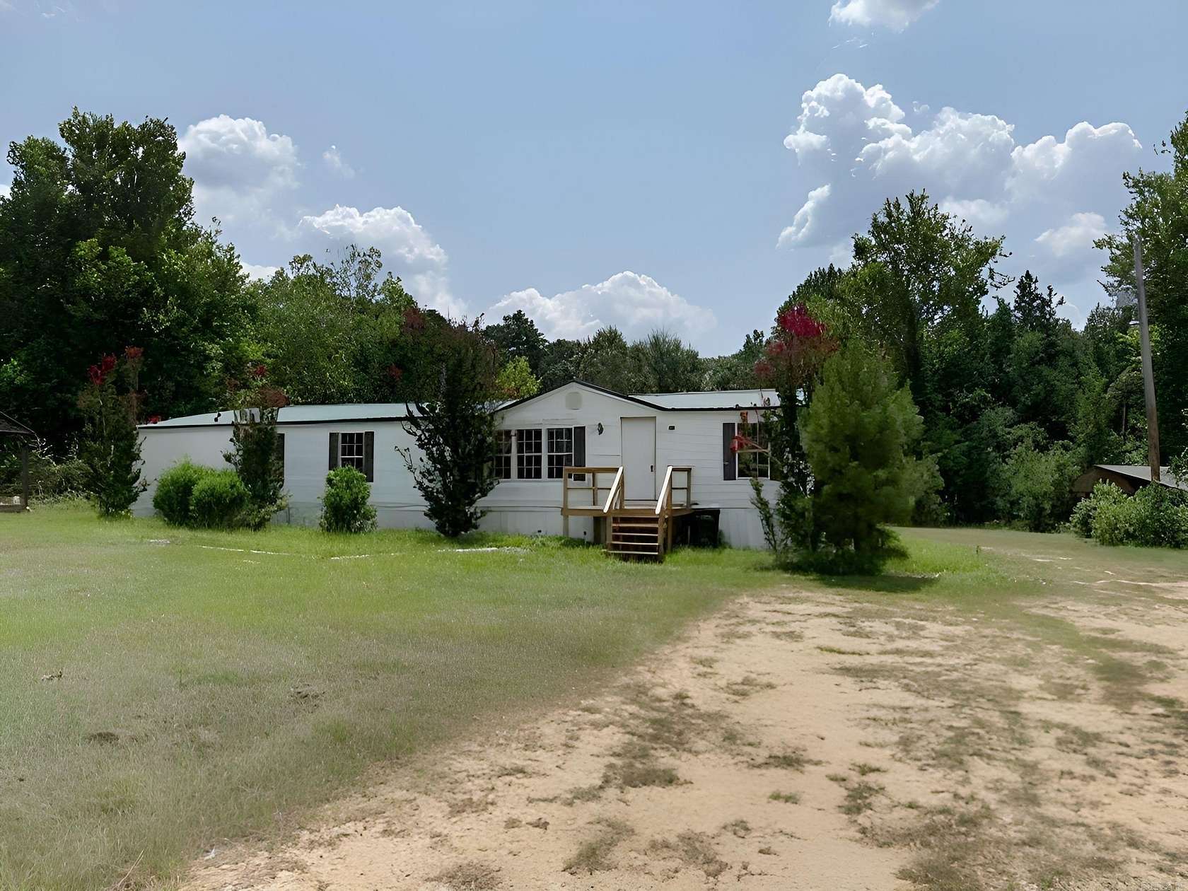 5.37 Acres of Land with Home for Sale in Banks, Arkansas