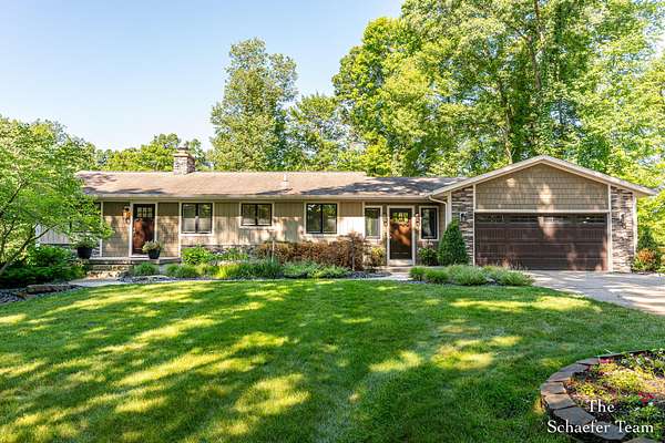 16.5 Acres of Recreational Land with Home for Sale in Lowell, Michigan