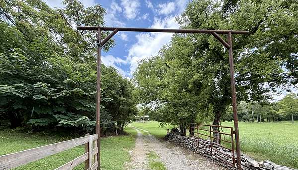 6.6 Acres of Land with Home for Sale in Pulaski, Tennessee