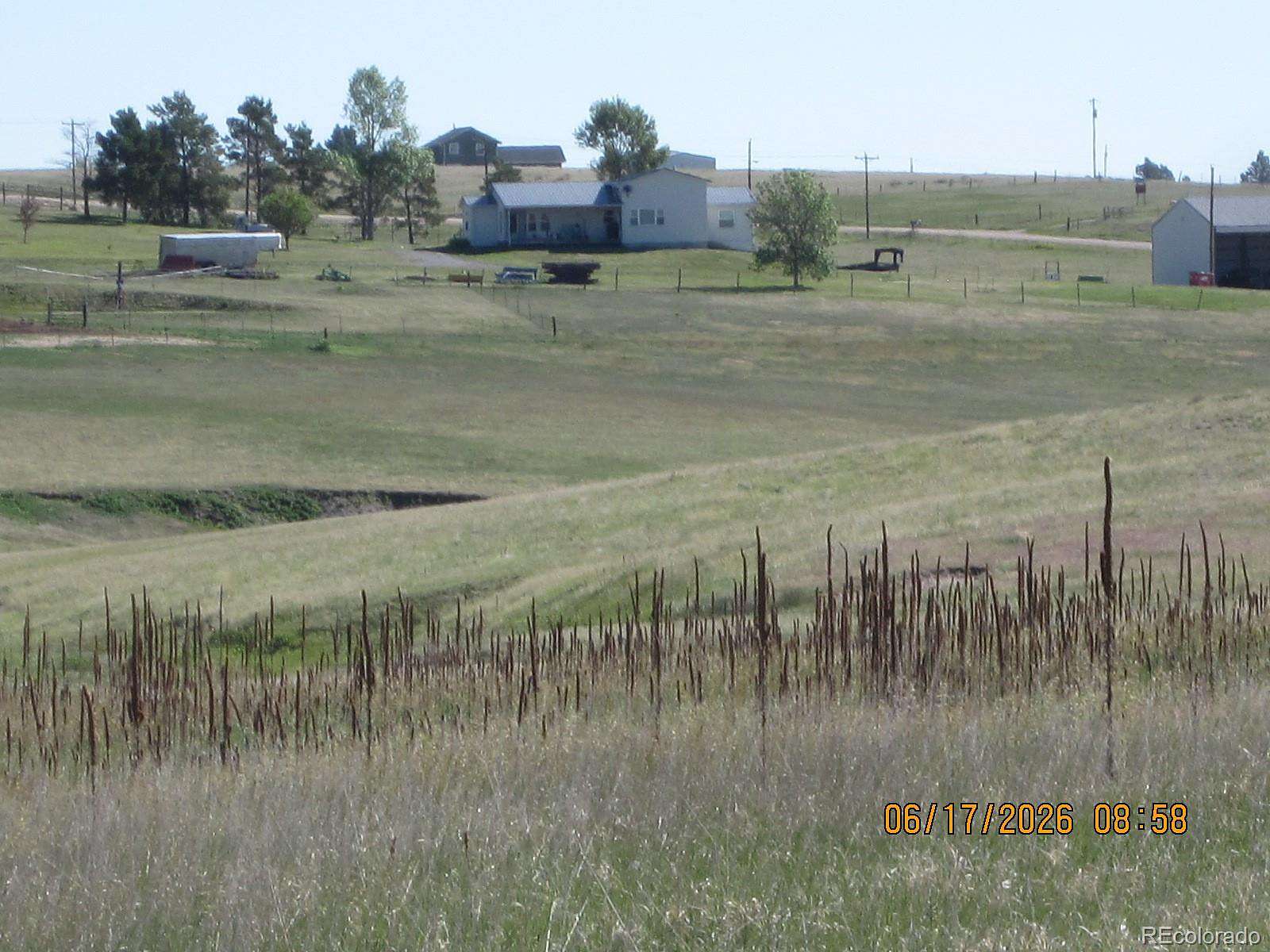 60 Acres of Agricultural Land with Home for Sale in Elizabeth, Colorado