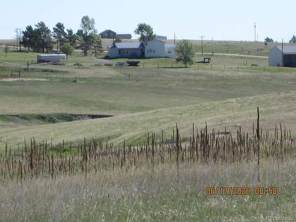 60 Acres of Agricultural Land with Home for Sale in Elizabeth, Colorado