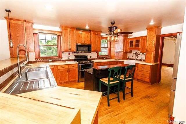 5 Acres of Land with Home for Sale in Burnside Township, Michigan