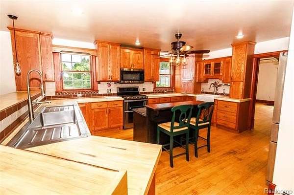 5 Acres of Land with Home for Sale in Burnside Township, Michigan