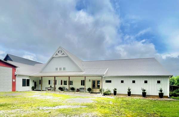 5.6 Acres of Land with Home for Sale in Gordonsville, Tennessee