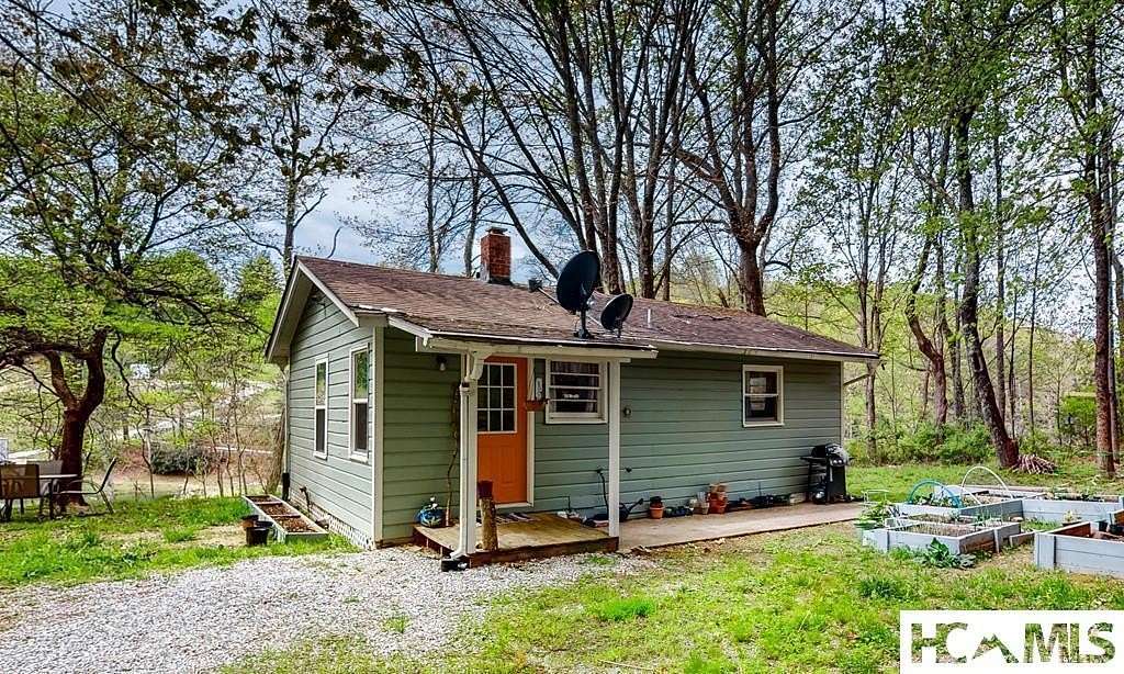 3.35 Acres of Land with Home for Sale in Scaly Mountain, North Carolina