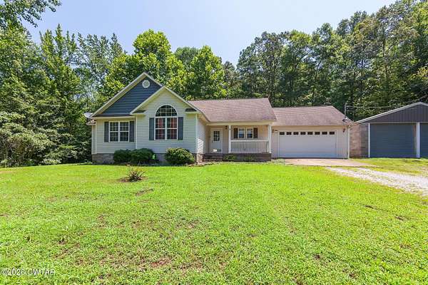 1.5 Acres of Land with Home for Sale in Henderson, Tennessee