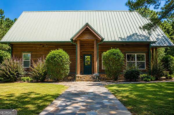 59.9 Acres of Recreational Land with Home for Sale in Dawson, Georgia
