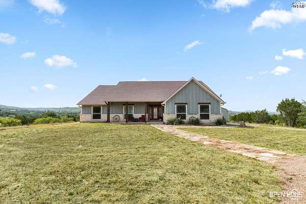 8.29 Acres of Land with Home for Sale in Graford, Texas