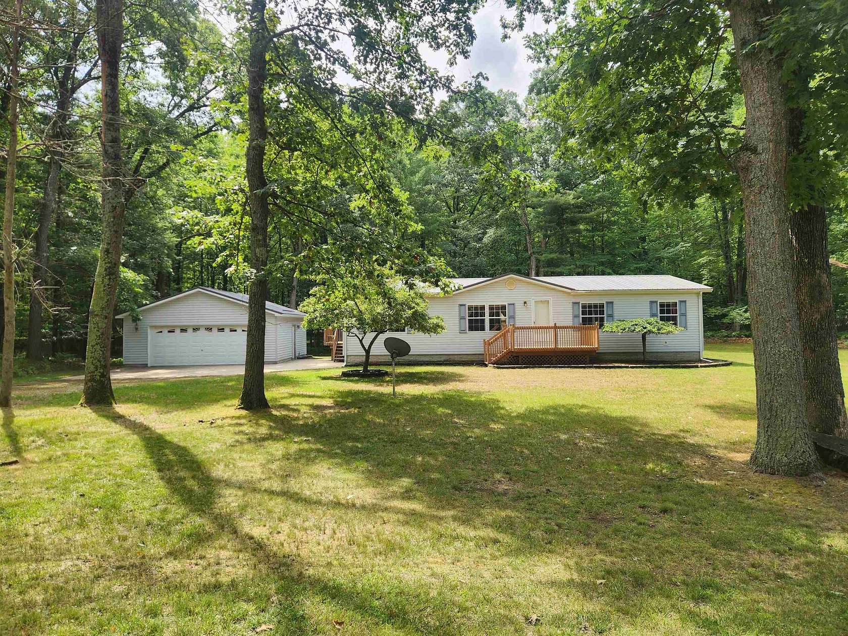 2.55 Acres of Land with Home for Sale in Farwell, Michigan
