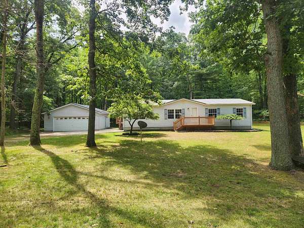 2.55 Acres of Land with Home for Sale in Farwell, Michigan