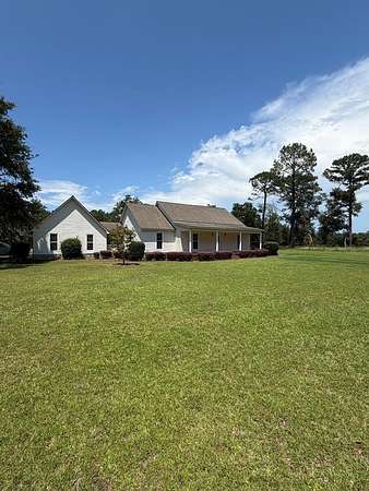 4 Acres of Land with Home for Sale in Nashville, Georgia