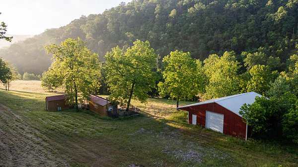 312 Acres of Recreational Land with Home for Sale in Washburn, Missouri