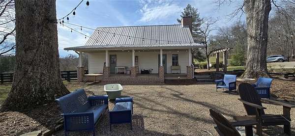 14.6 Acres of Land with Home for Lease in Ball Ground, Georgia