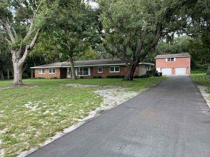 2.34 Acres of Land with Home for Sale in Brandon, Florida