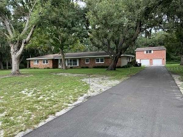 2.34 Acres of Land with Home for Sale in Brandon, Florida