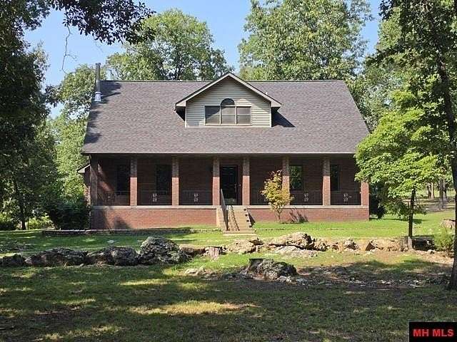 7.24 Acres of Land with Home for Sale in Mountain Home, Arkansas