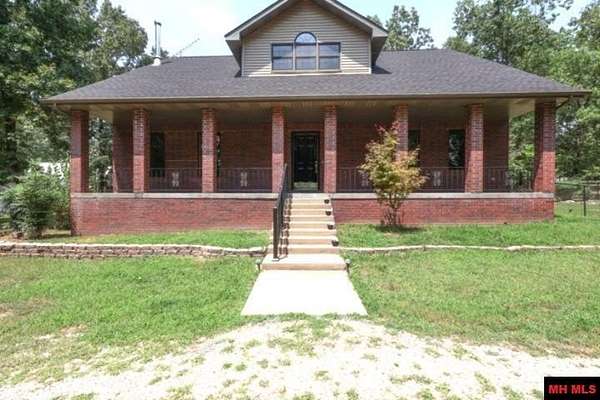 7.24 Acres of Land with Home for Sale in Mountain Home, Arkansas