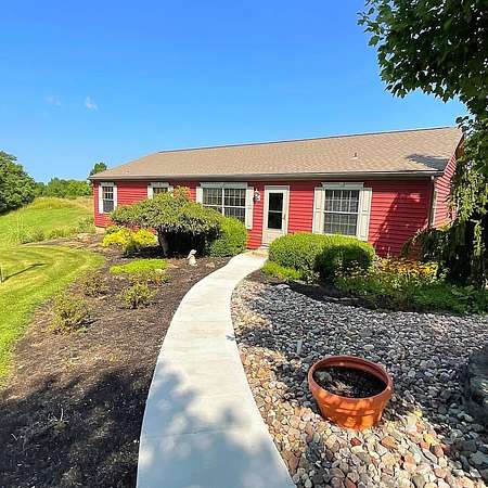 11.8 Acres of Land with Home for Sale in Foster, Kentucky