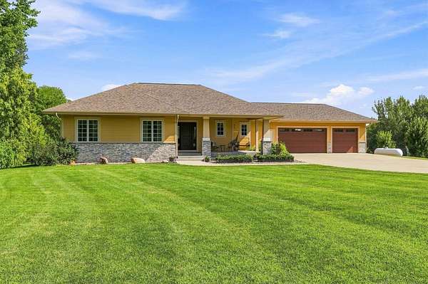 5 Acres of Land with Home for Sale in Norwalk, Iowa
