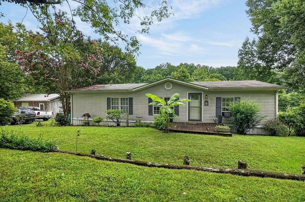 4.15 Acres of Land with Home for Sale in Hilham, Tennessee