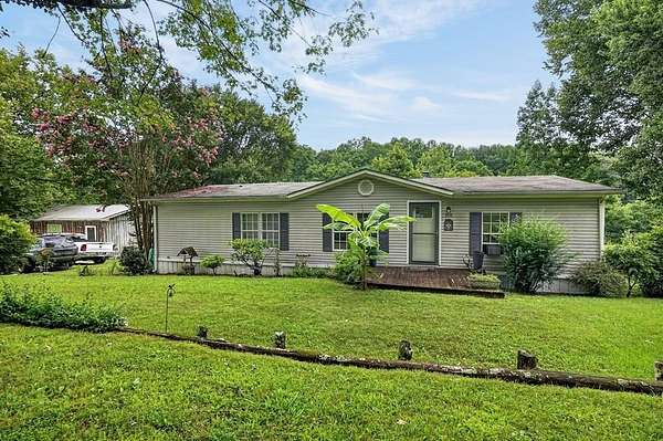 4.15 Acres of Land with Home for Sale in Hilham, Tennessee