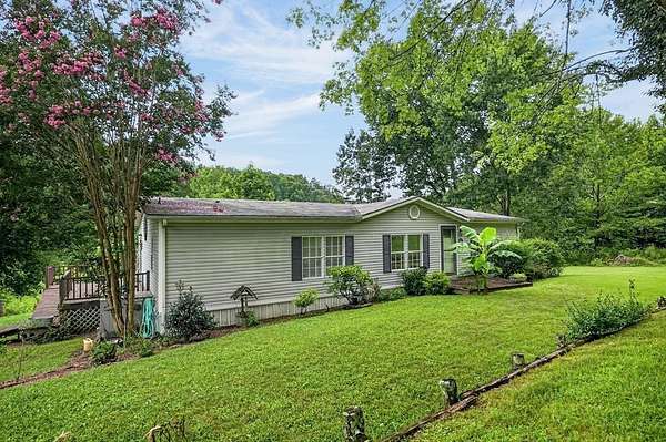 4.15 Acres of Land with Home for Sale in Hilham, Tennessee