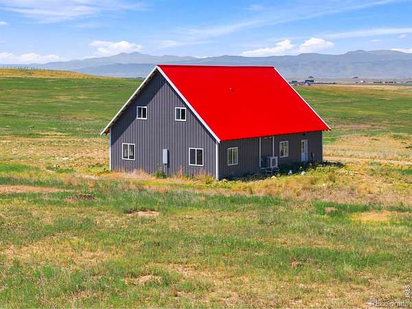 80 Acres of Agricultural Land with Home for Sale in Carr, Colorado