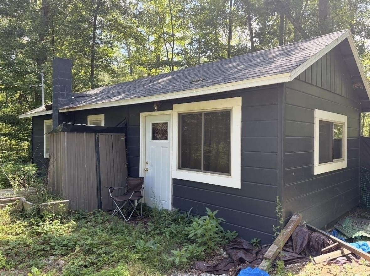 0.65 Acres of Land with Home for Sale in Harrison, Michigan