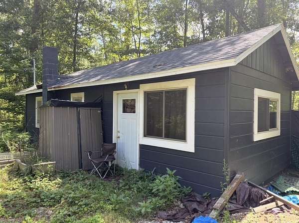 0.65 Acres of Land with Home for Sale in Harrison, Michigan