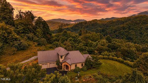 5.79 Acres of Land with Home for Sale in Hampton, Tennessee