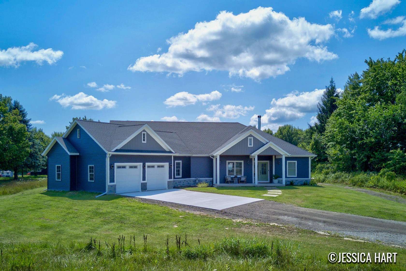 5 Acres of Land with Home for Sale in Rockford, Michigan