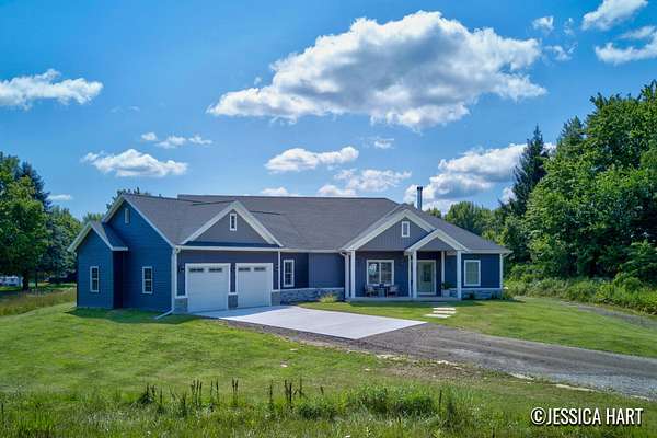 5 Acres of Land with Home for Sale in Rockford, Michigan