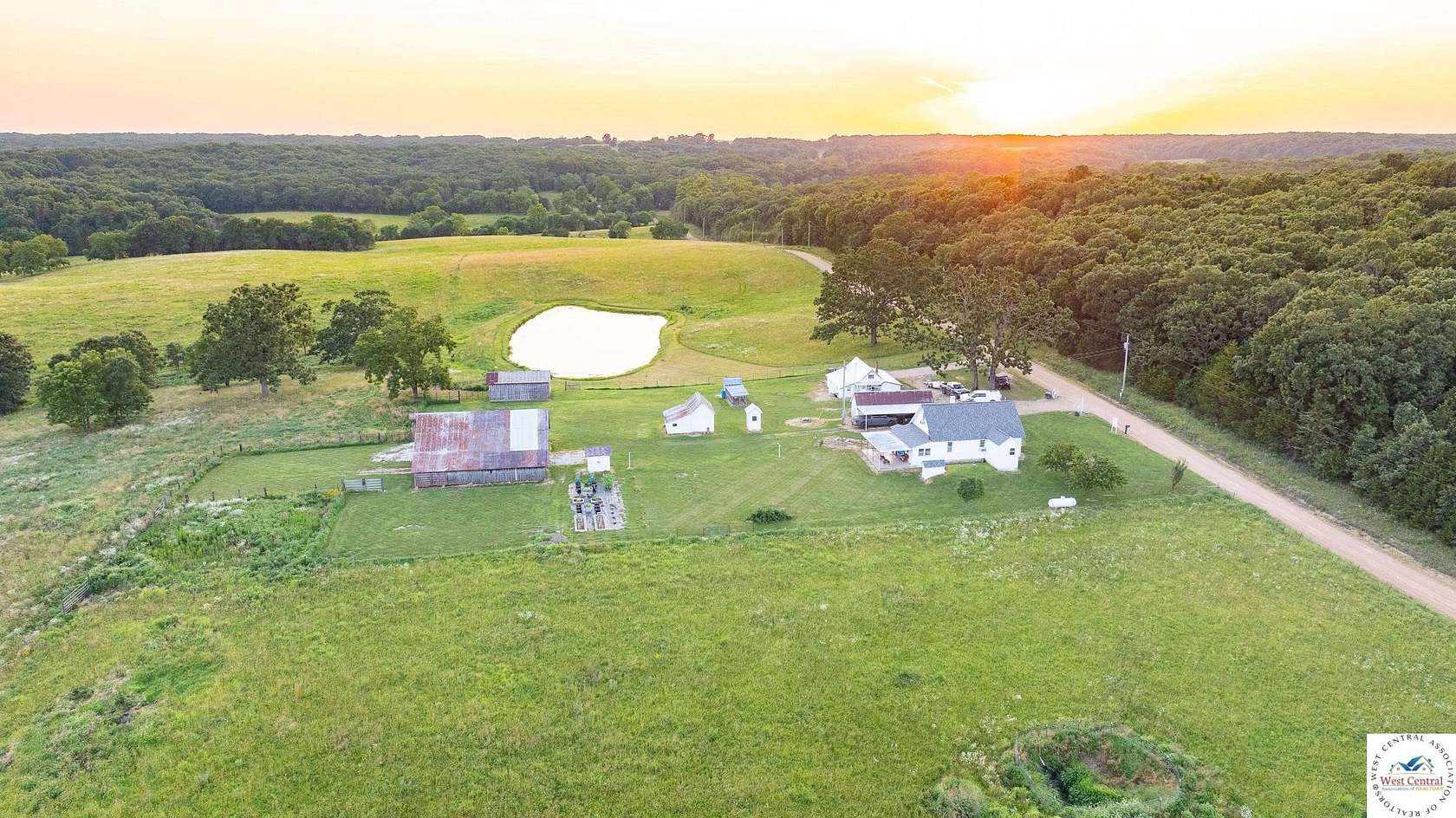156 Acres of Land with Home for Sale in Cross Timbers, Missouri